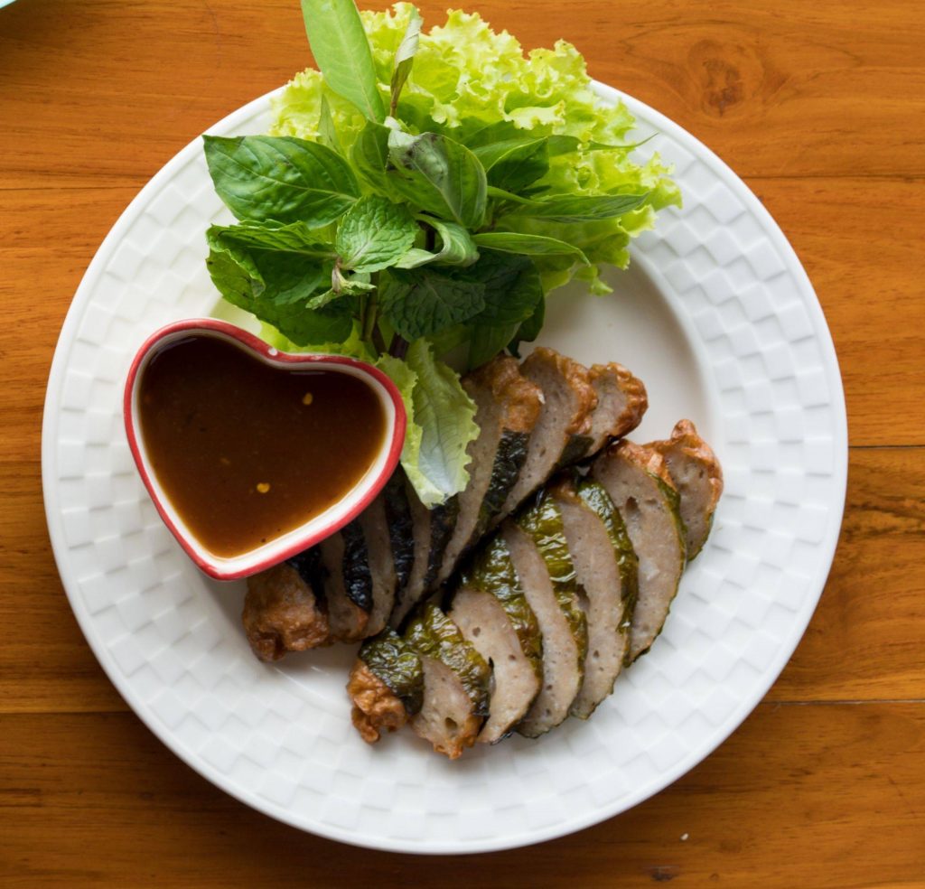 Cha Pu Moo Yang, Grilled Pork wrapped in wild betel leaf, what to eat in Chiang Rai, Northern food 